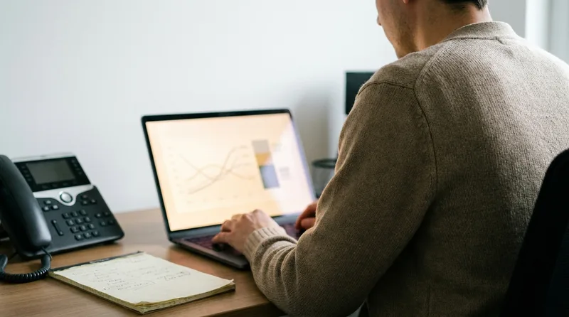 Practice manager reviewing a call tracking dashboard to measure dental marketing ad ROI